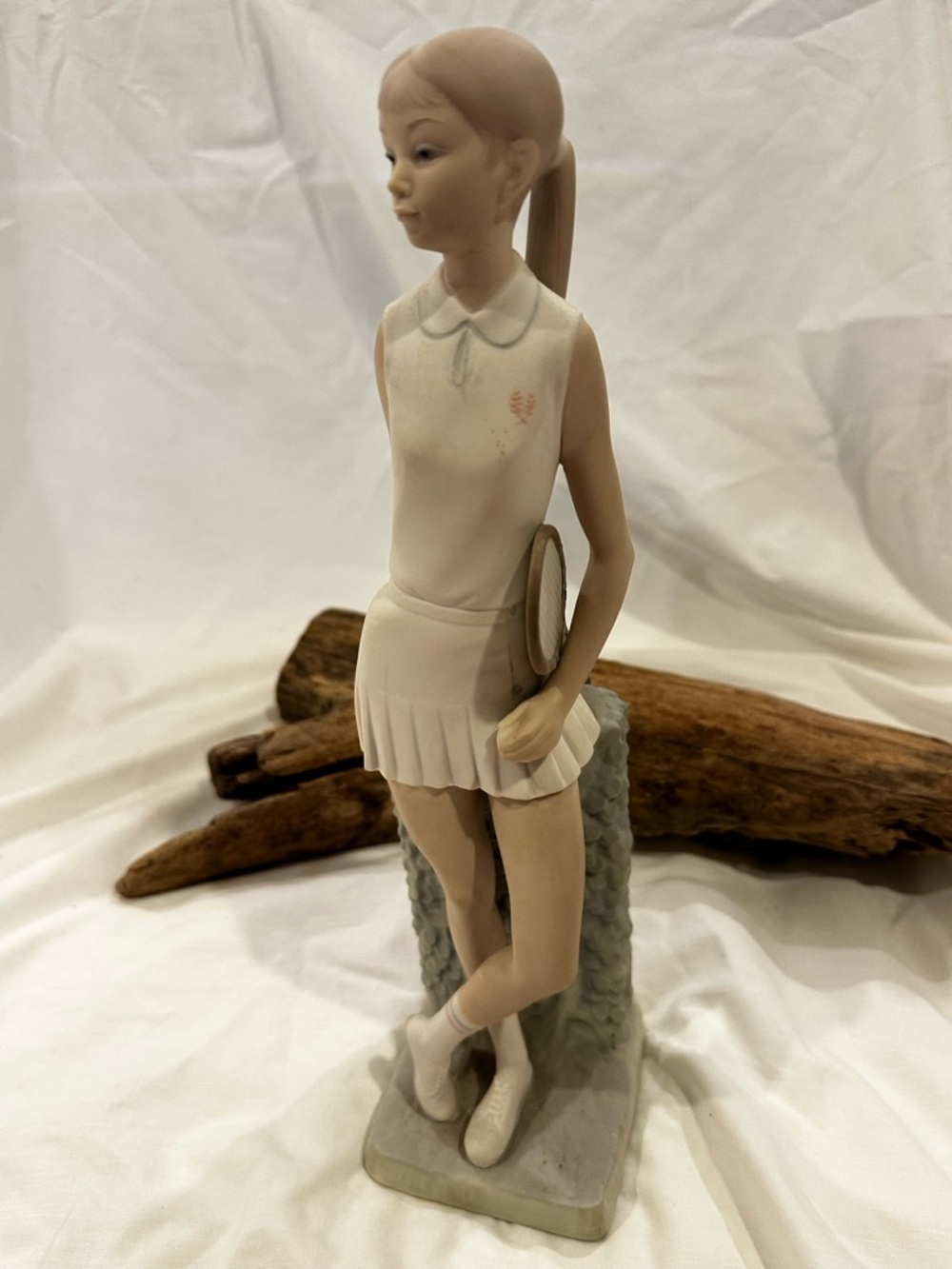 Lladro Tennis Player Girl figurine